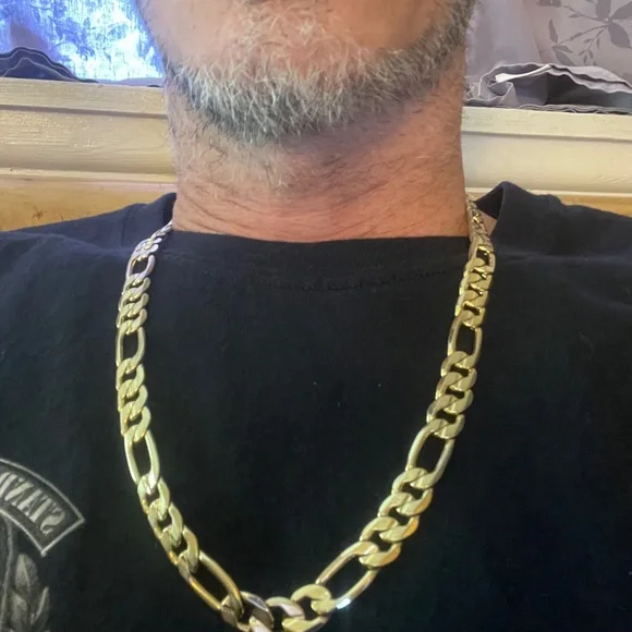 14k Gold 22” 10mm Figaro Chain weighs 72 grams.